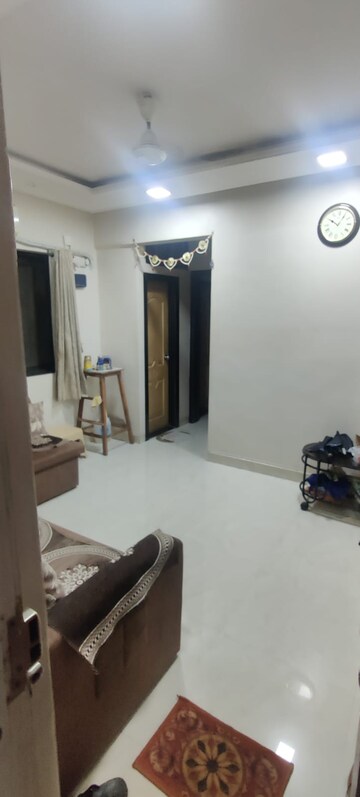 Living Room in 1 BHK Apartment at Gundecha Marigold, Kandivali East – for Sale