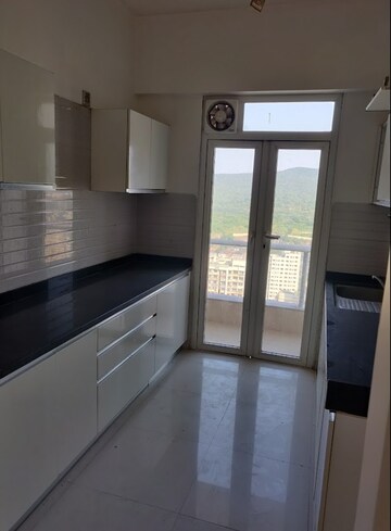 Kitchen in 3 BHK Apartment at Transcon Triumph Tower, Andheri West – for Sale