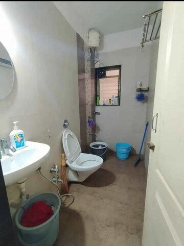 Bathroom in 2.5 BHK Apartment at Shree Satya Shankar Residency, Manpada – for Sale