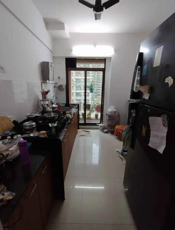 Kitchen in 2.5 BHK Apartment at Shree Satya Shankar Residency, Manpada – for Sale