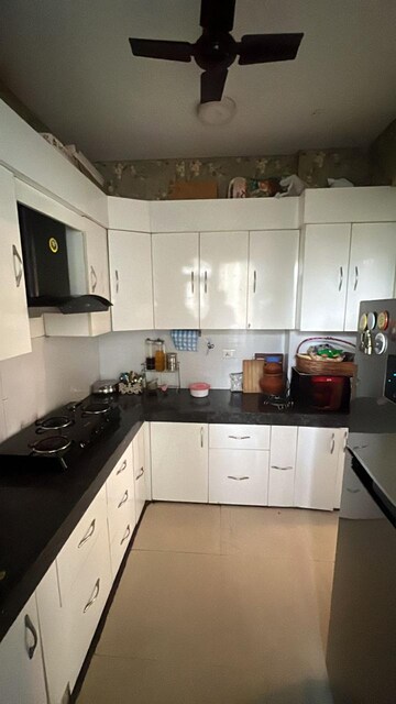 Kitchen in 2 BHK Apartment at Godrej Meridien, Sector 106 – for Sale
