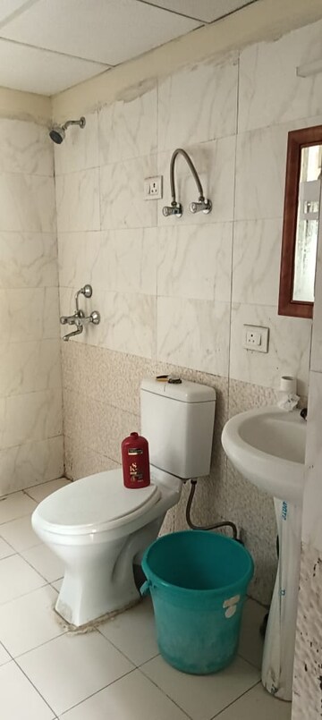 Bathroom in 2.5 BHK Apartment at Aims Golf City, Sector 75 – for Sale