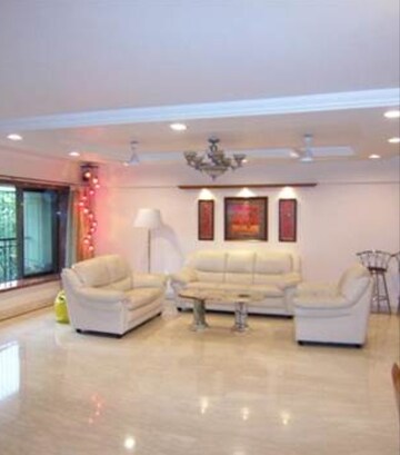 Living Room in 4 BHK Apartment at Juhu – for Sale