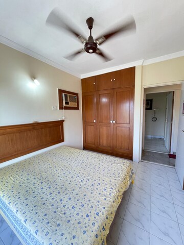 Bedroom in 2 BHK Apartment at Lokhandwala Riviera Tower, Kandivali East – for Sale