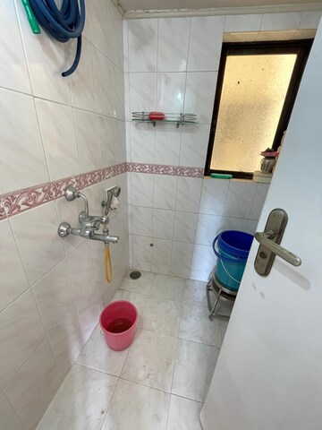 Master Bedroom in 2 BHK Apartment at Lokhandwala Riviera Tower, Kandivali East – for Sale