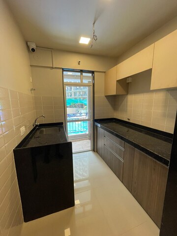 Kitchen in 1 BHK Apartment at JP North Alexa, Mira Road – for Sale