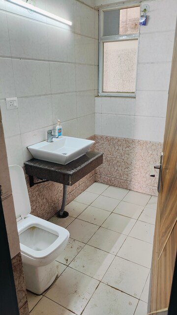 Bathroom in 3 BHK Apartment at Apex Alphabet, Tech Zone 4 Greater Noida – for Sale