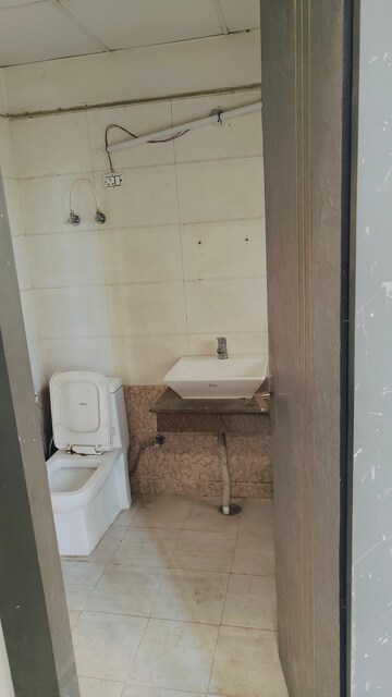 Bathroom in 3 BHK Apartment at Apex Alphabet, Tech Zone 4 Greater Noida – for Sale
