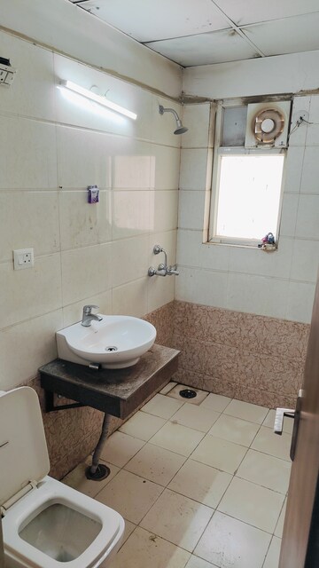 Bathroom in 3 BHK Apartment at Apex Alphabet, Tech Zone 4 Greater Noida – for Sale