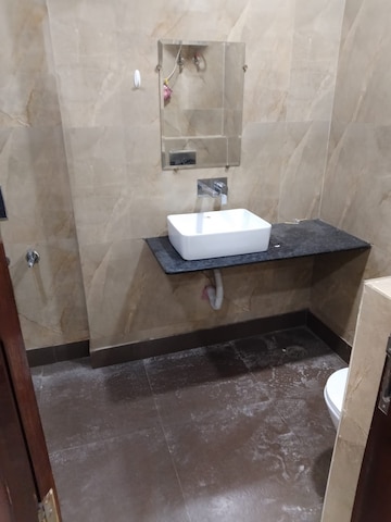 Bathroom in 2.5 BHK Apartment at Rohini Sector 13 – for Sale