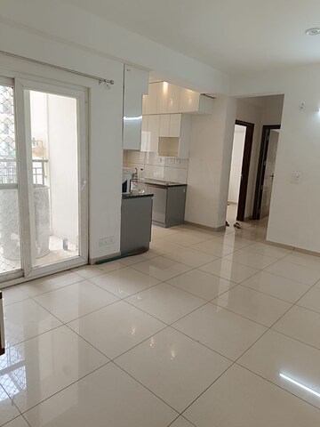 Building Lobby in 2 BHK Apartment at Gulshan Botnia, Sector 144 – for Sale