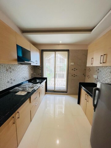Kitchen in 2 BHK Apartment at Tharwani Meghna Montana, Ambernath West – for Sale