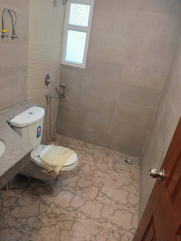 Bathroom in 3 BHK Apartment at Samridhi Luxuriya Avenue, Sector 150 – for Sale