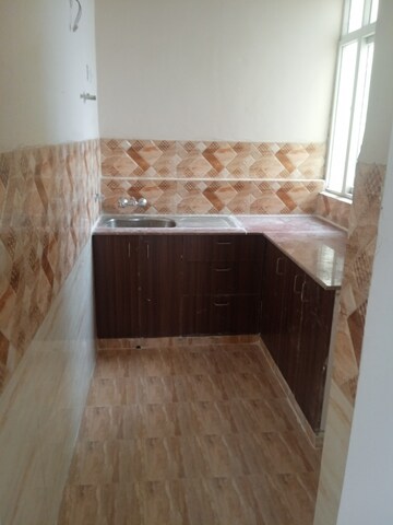 Kitchen in 2 BHK Apartment at Amrapali Golf Homes, Sector 4, Greater Noida – for Sale