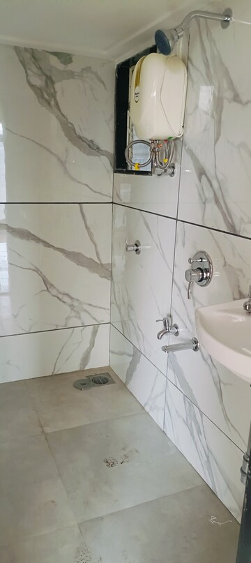 Bathroom in 1 BHK Apartment at RNA NG Diamond Hill, Beverly Park – for Sale