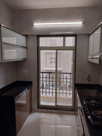Kitchen in 1 BHK Apartment at Agarwal Paramount, Virar West – for Sale