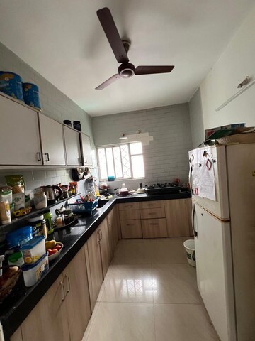 Kitchen in 2 BHK Apartment at Kolte Patil Green Acre, Salunkhe Vihar Society – for Sale