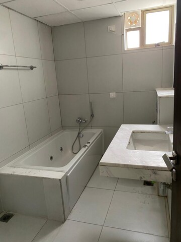Bathroom in 4 BHK Apartment at Tata Primanti-Tower Residences, Sector 72 – for Sale