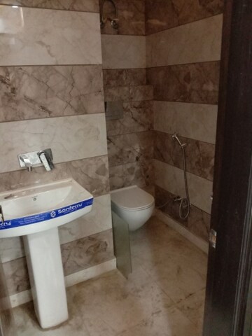 Bathroom in 3 BHK Builder Floor at Dwarka Mor – for Sale