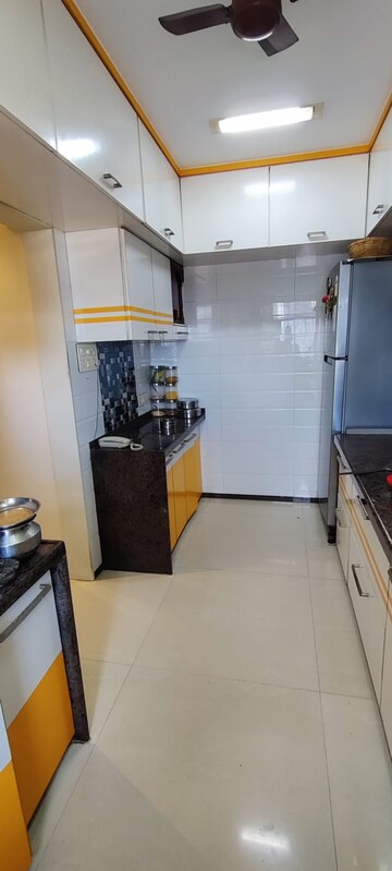 Kitchen in 2 BHK Apartment at Vasant Sagar, Kandivali East – for Sale