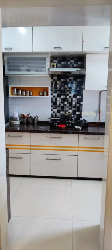 Kitchen in 2 BHK Apartment at Vasant Sagar, Kandivali East – for Sale