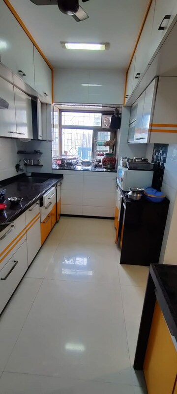 Kitchen in 2 BHK Apartment at Vasant Sagar, Kandivali East – for Sale