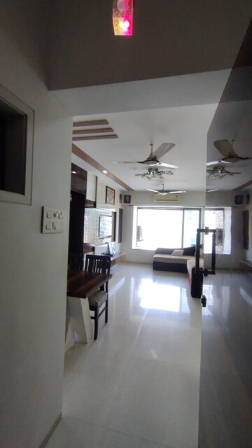 Living Room in 1 BHK Apartment at Raheja Reflections, Kandivali East – for Sale