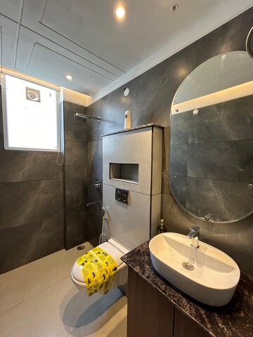 Bathroom in 3 BHK Apartment at Dhakoli Village – for Sale