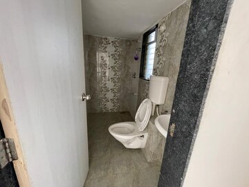 Bathroom in 2 BHK Apartment at Om Dronagiri CHS, Borivali East – for Sale