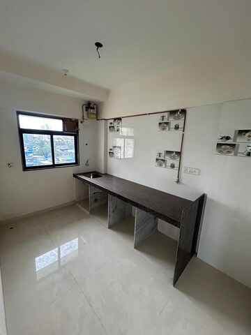 Kitchen in 1 BHK Apartment at Laxmi Umesh Apartments, Dahisar East – for Sale
