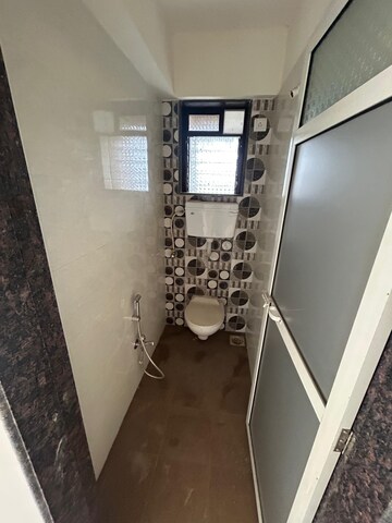 Bathroom in 1 BHK Apartment at Laxmi Umesh Apartments, Dahisar East – for Sale