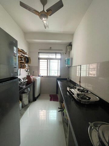 Kitchen in 1 BHK Apartment at Sheth Midori, Dahisar East – for Sale