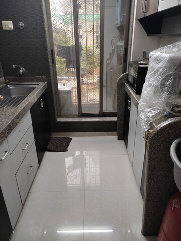 Kitchen in 2 BHK Apartment at Shree Niketan, Kandivali West – for Rent
