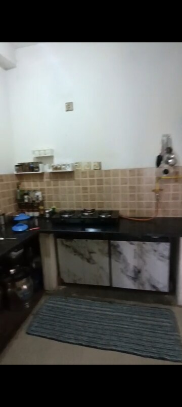 Kitchen in 2.5 BHK Apartment at Mahagun Mywoods, Sector 16c Greater Noida – for Sale