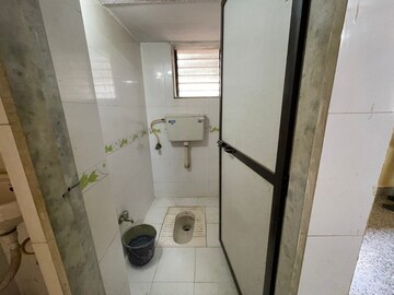 Bathroom in 1 BHK Apartment at Alaknanda CHS, Dahisar East – for Sale