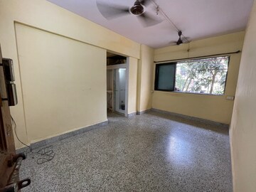 Living Room in 1 BHK Apartment at Alaknanda CHS, Dahisar East – for Sale