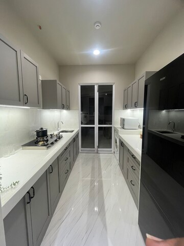 Kitchen in 2 BHK Apartment at Vihang Luxuria, Mira Road – for Sale
