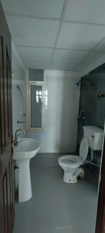 Bathroom in 3.5 BHK Apartment at Saviour Greenisle, Sain Vihar – for Sale