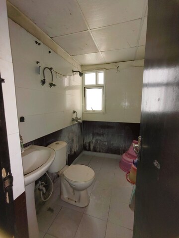 Attached Bathroom in 3 BHK Apartment at Mahagun Mascot, Sain Vihar – for Sale