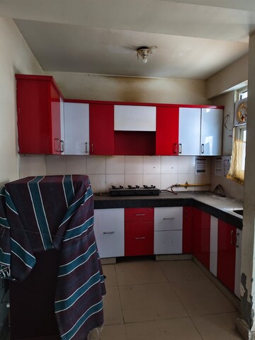 Kitchen in 3 BHK Apartment at Mahagun Mascot, Sain Vihar – for Sale