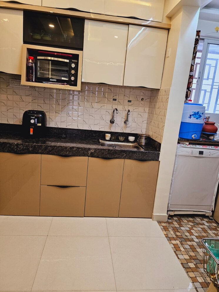 Kitchen, atrium-skyward 1 Bedroom 568 Sq.Ft. Apartment In Undri Pune 7339104