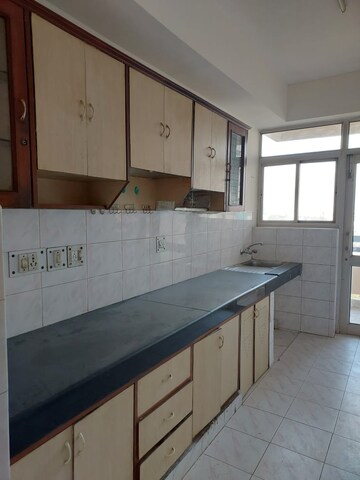 Kitchen in 3 BHK Apartment at Ansal Sushant Estate, Sector 52 – for Sale