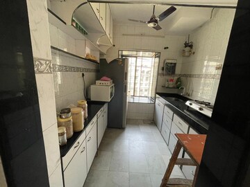 Kitchen in 1 BHK Apartment at Windsor CHS, Ashok Van – for Sale