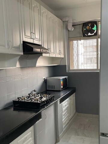 Kitchen in 2 BHK Apartment at Unitech The Residences Sector 33, Sector 33 – for Sale