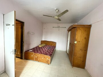 Bedroom in 1 BHK Apartment at Shree Suryodaya CHS, Dahisar East – for Sale