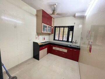 Kitchen in 1 BHK Apartment at Raj Shivam Society, Dahisar East – for Sale