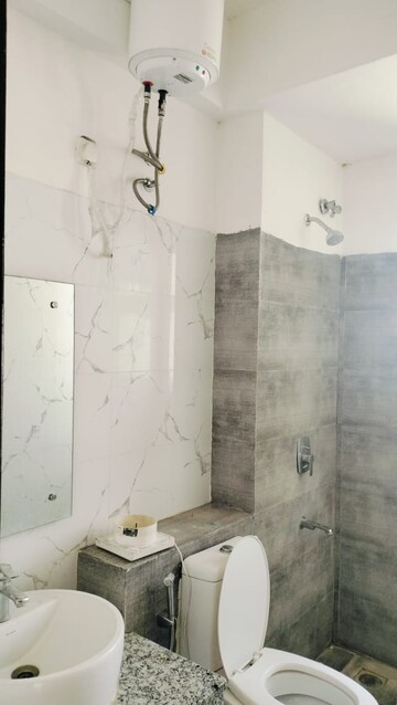 Bathroom in 2.5 BHK Apartment at Umang Winter Hills, Sector 77 – for Sale