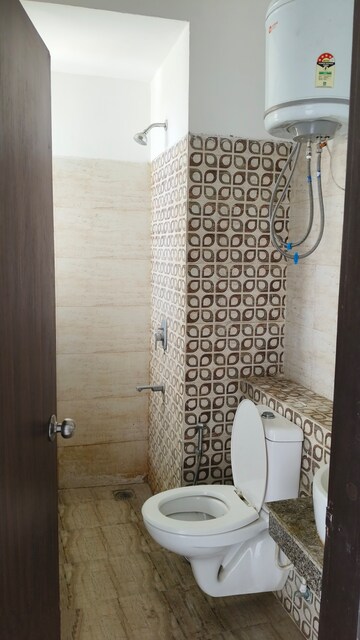 Bathroom in 3 BHK Apartment at Umang Winter Hills, Sector 77 – for Sale