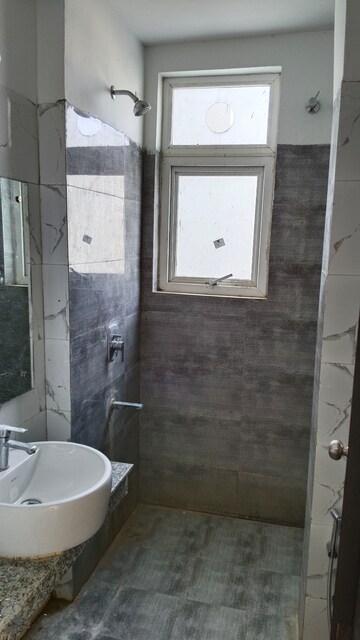 Bathroom in 3 BHK Apartment at Umang Winter Hills, Sector 77 – for Sale