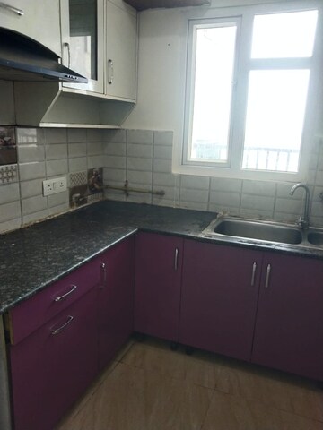 Kitchen in 2 BHK Apartment at Gaur Atulyam, Omicron I Greater Noida – for Sale